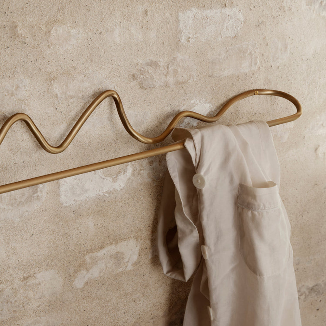 Curvature Towel Hanger